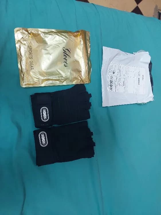 Buyer photo 1 of 2, black · XL