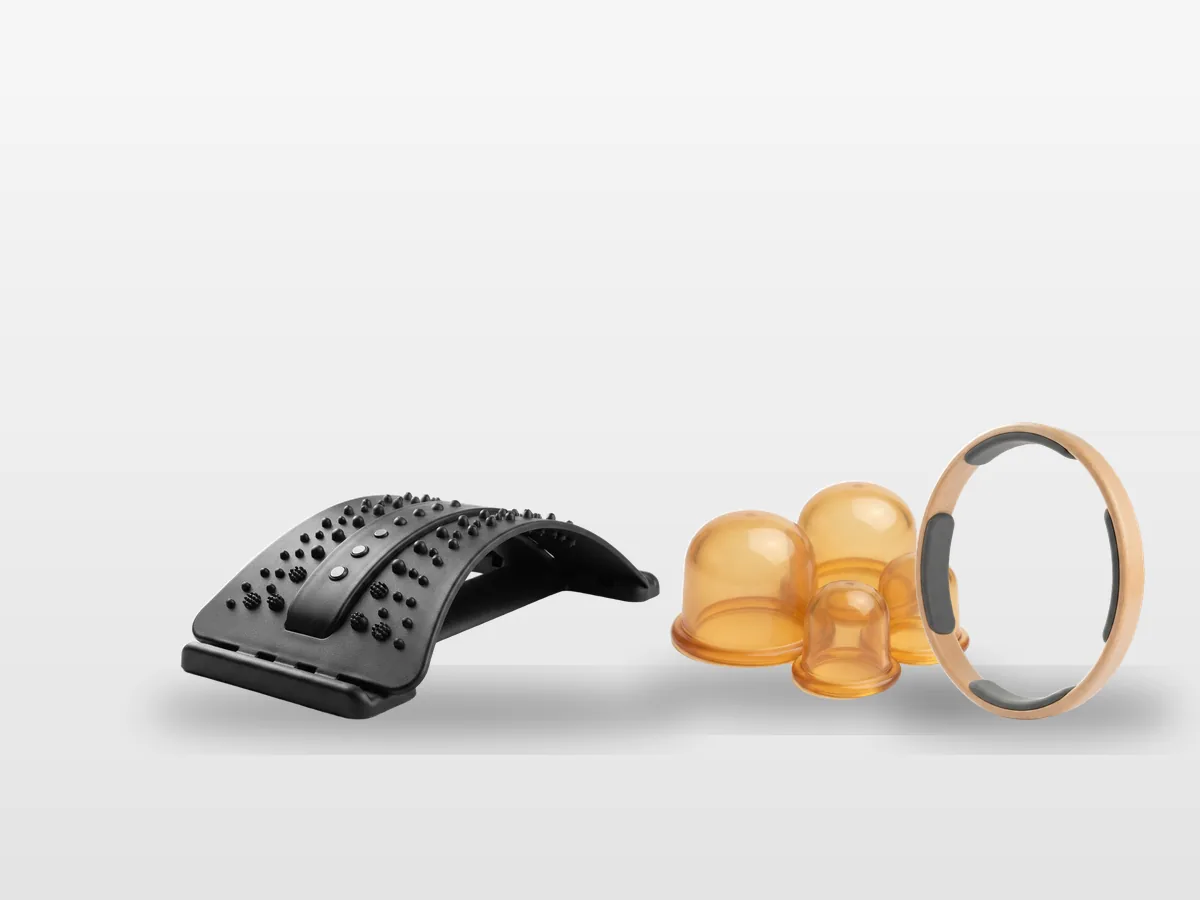 A lumbar stretcher board, a silicone cupping set and a yoga ring